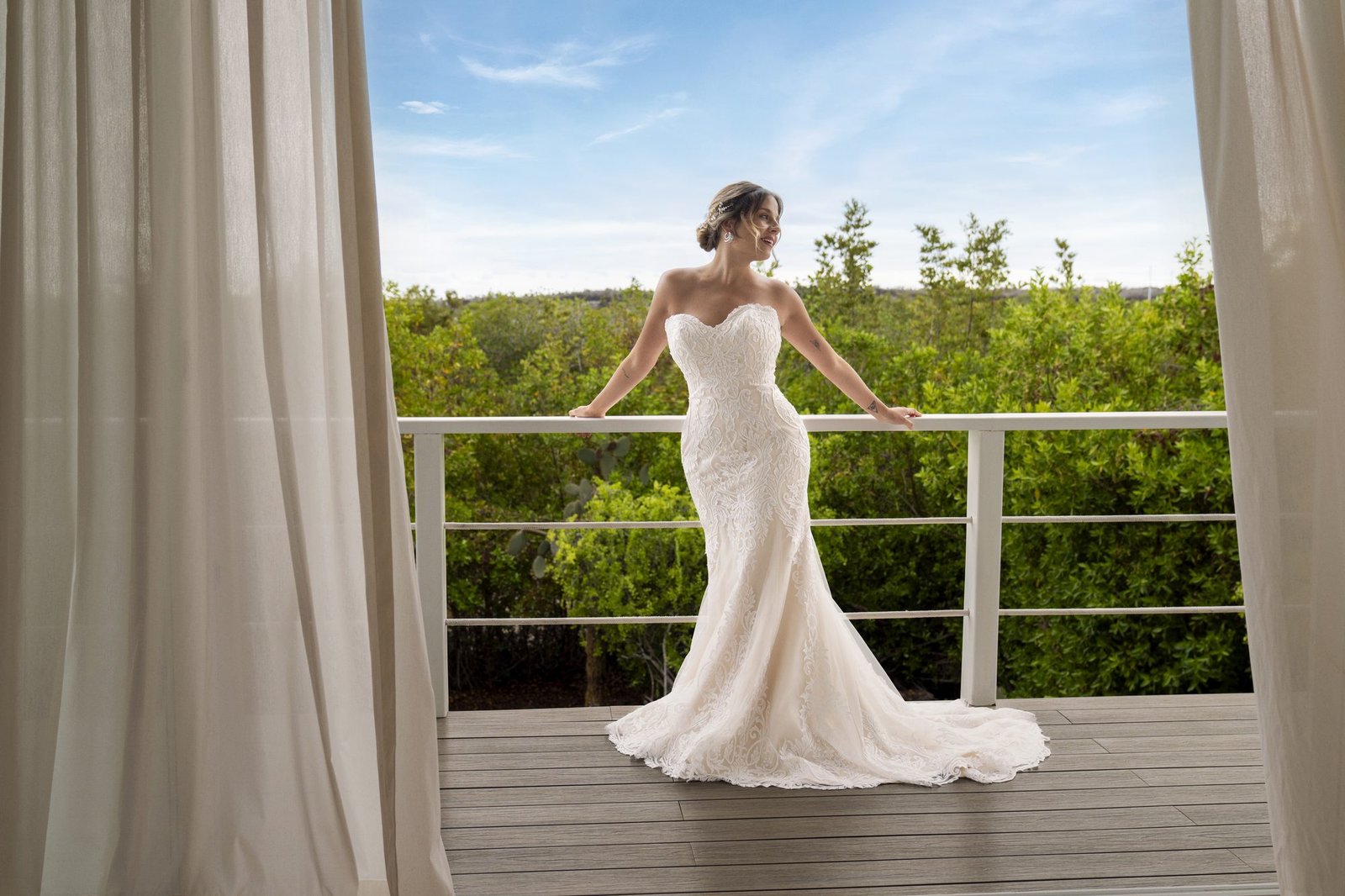 Bride on a balcony overlooking the Galapagos
