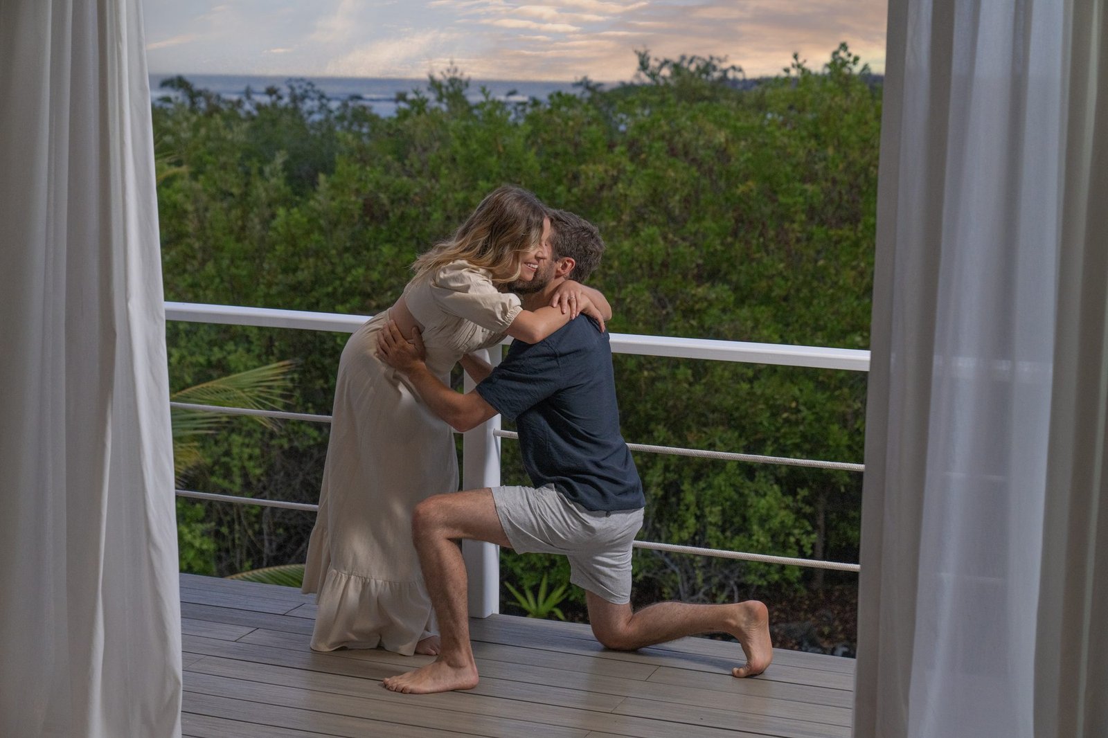 Couple celebrating at Finch Bay, Galapagos