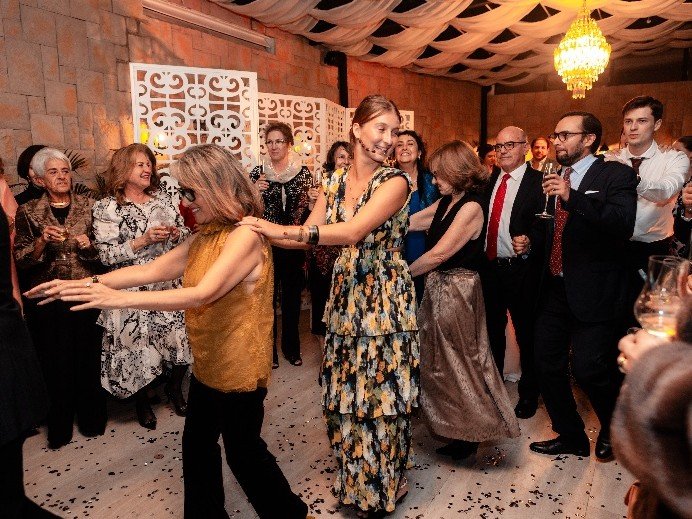 Guests dancing at a private celebration